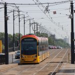 Zdjęcie przedstawia tramwaj na moście Poniatowskiego.